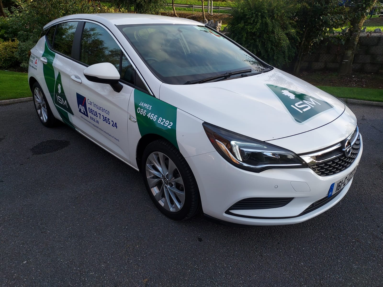 White James Flynn Driving School Opel Astra with door signage and 086 466 8292, Mitchelstown